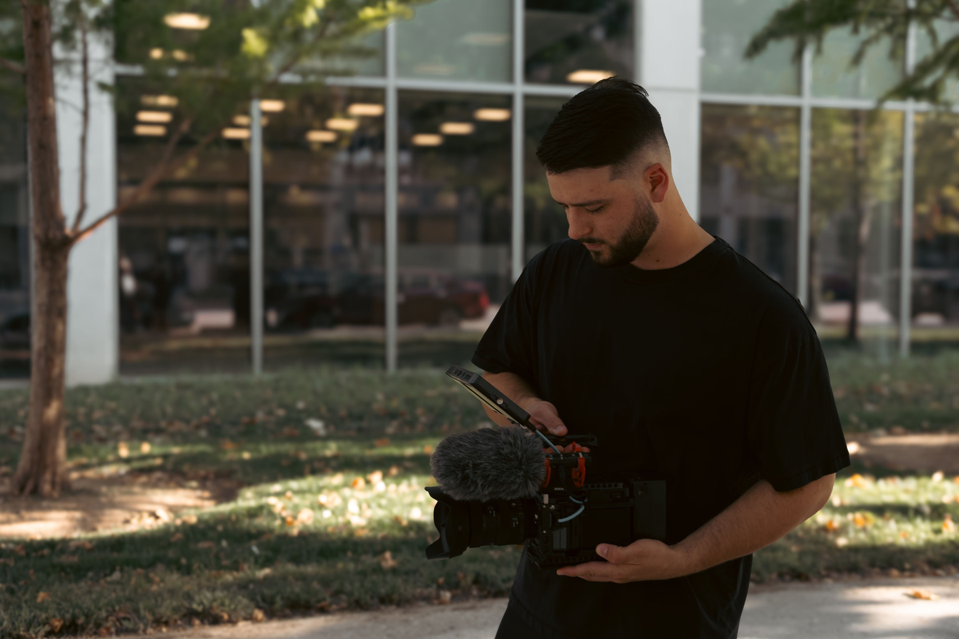 Cody V Smith of BTS Productions reviewing footage on set in Oklahoma City